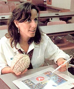 Laura Schopp, PhD, explains brain functioning to a rural mental health provider using interactive video