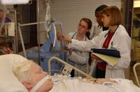 Dana Evans observing Amanda and Michael during their Clinicals